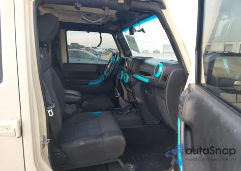 2011 Jeep Wrangler Unlimited Sahara z USA, uszkodzony, nr VIN 1J4HA5H19BL558161